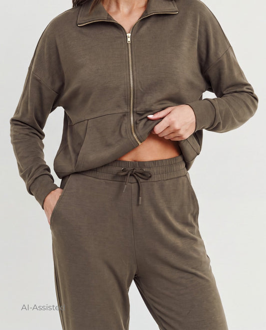 Chaqueta cremallera y pantalon gris