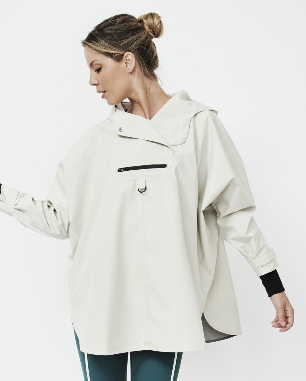 Poncho cortavientos camel