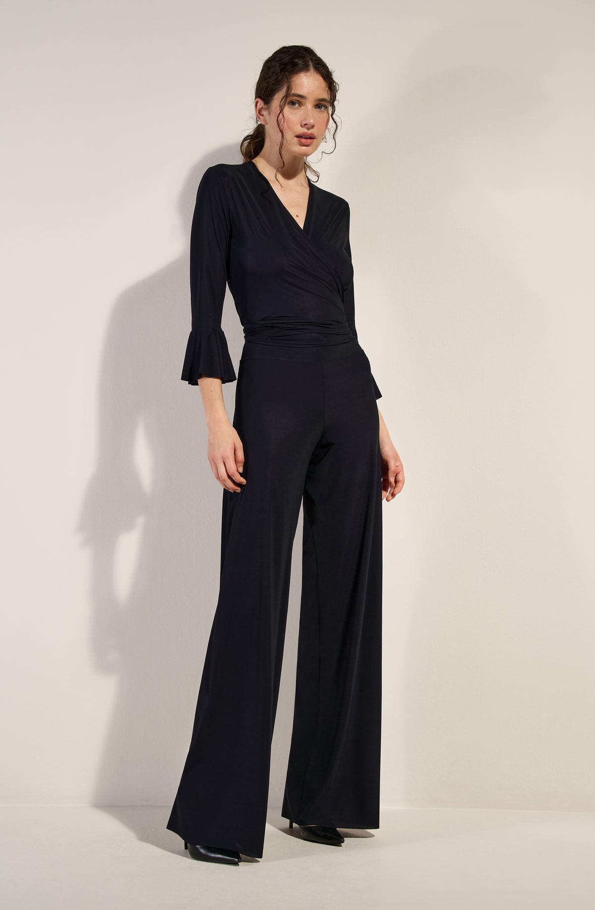 TIMA - Pantalón negro - flanesyfresones