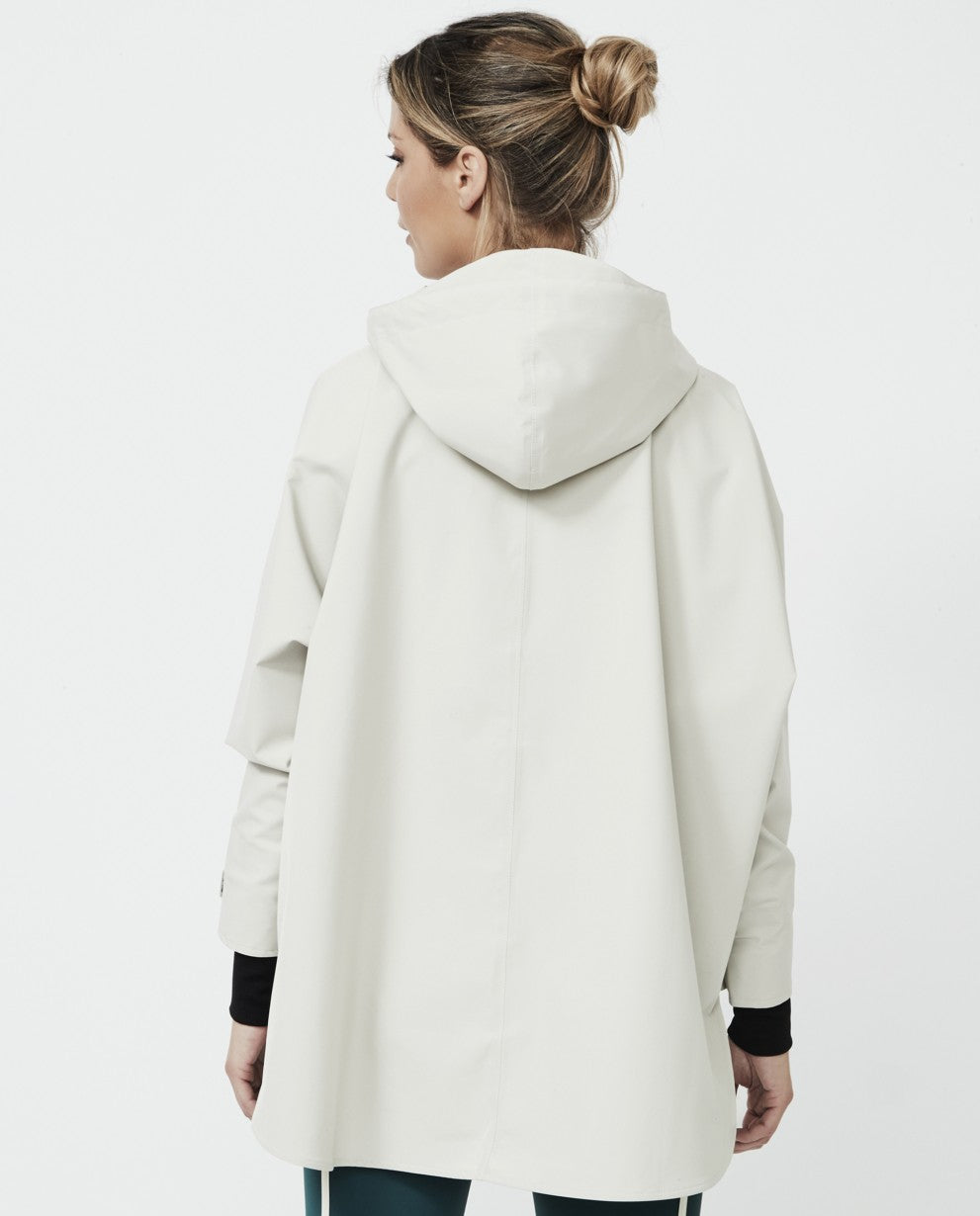 Poncho cortavientos camel
