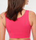 Top deportivo fucsia