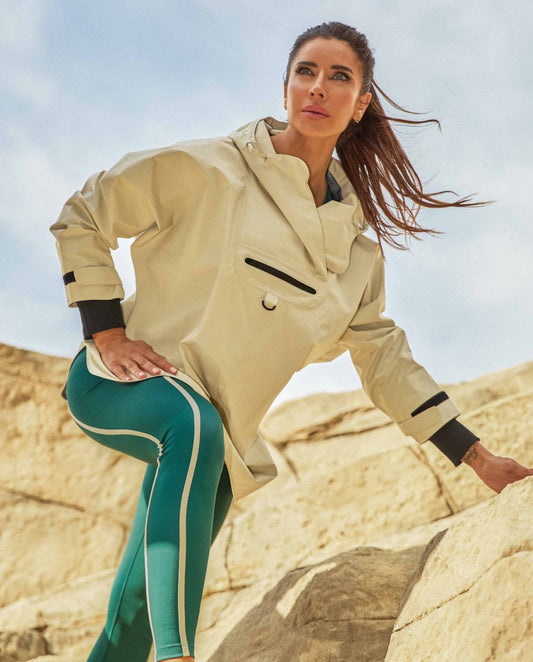 Poncho cortavientos camel